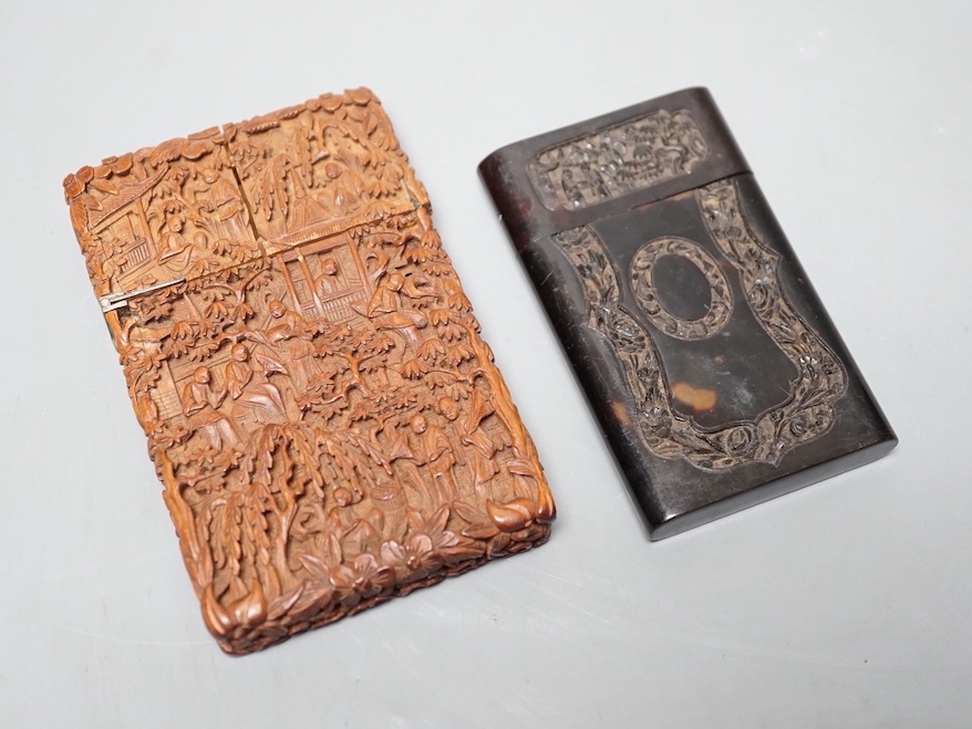 A 19th century Chinese tortoiseshell card case and a similar carved sandalwood card case, 11 cms high x 7 cms wide.